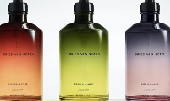 Three Dries Van Noten bottles in warm gradients